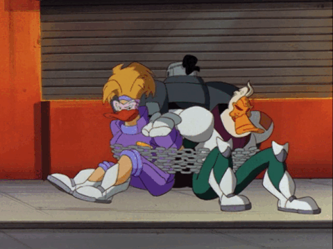 Grin, Tanya and Wildwing, breaking out of Mondo-Man's chains