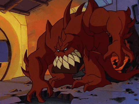 a huge red alien monster with sharp claws and sharper teeth